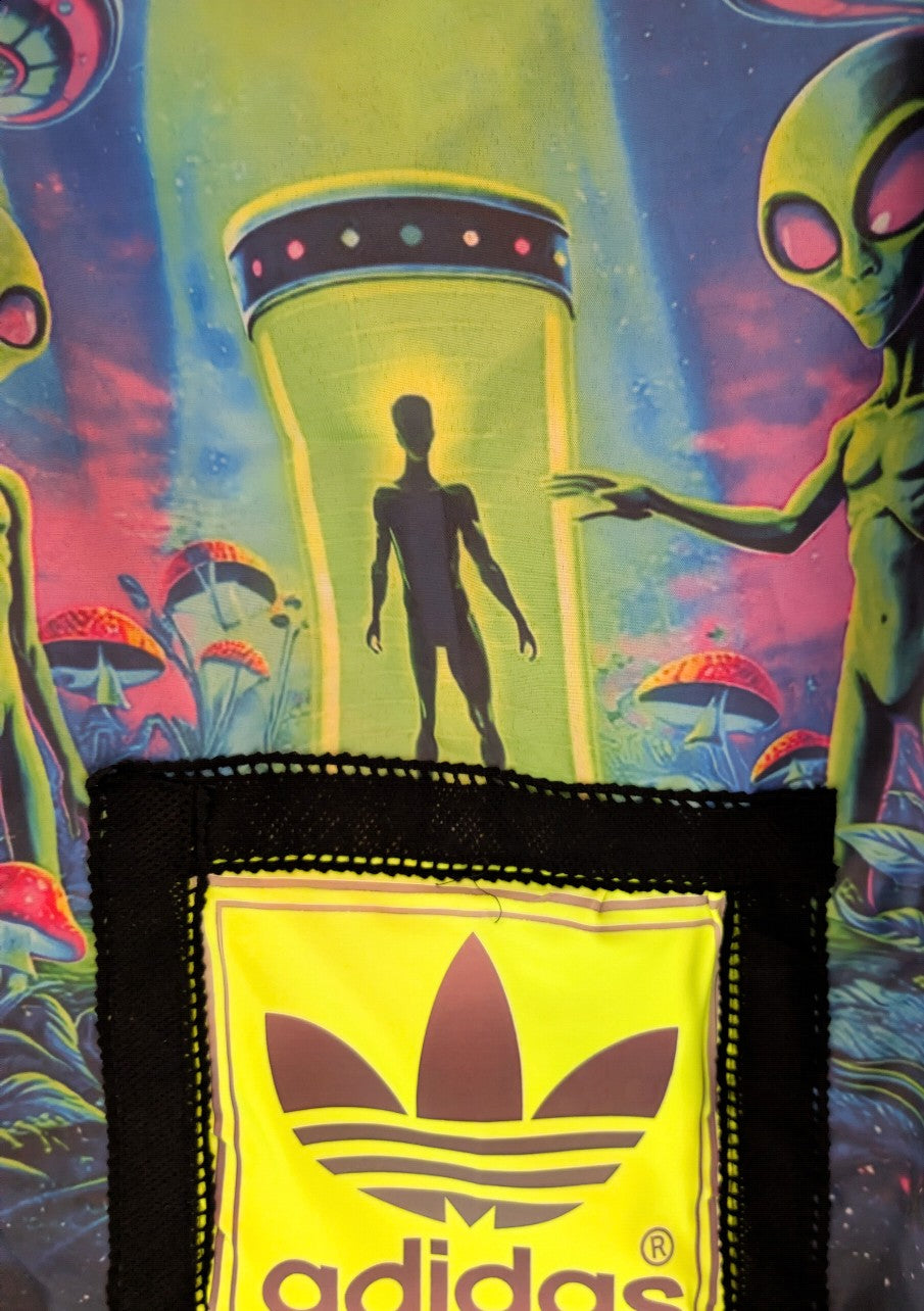 Space Alien jacket made from recycled camouflage and graphic prints.